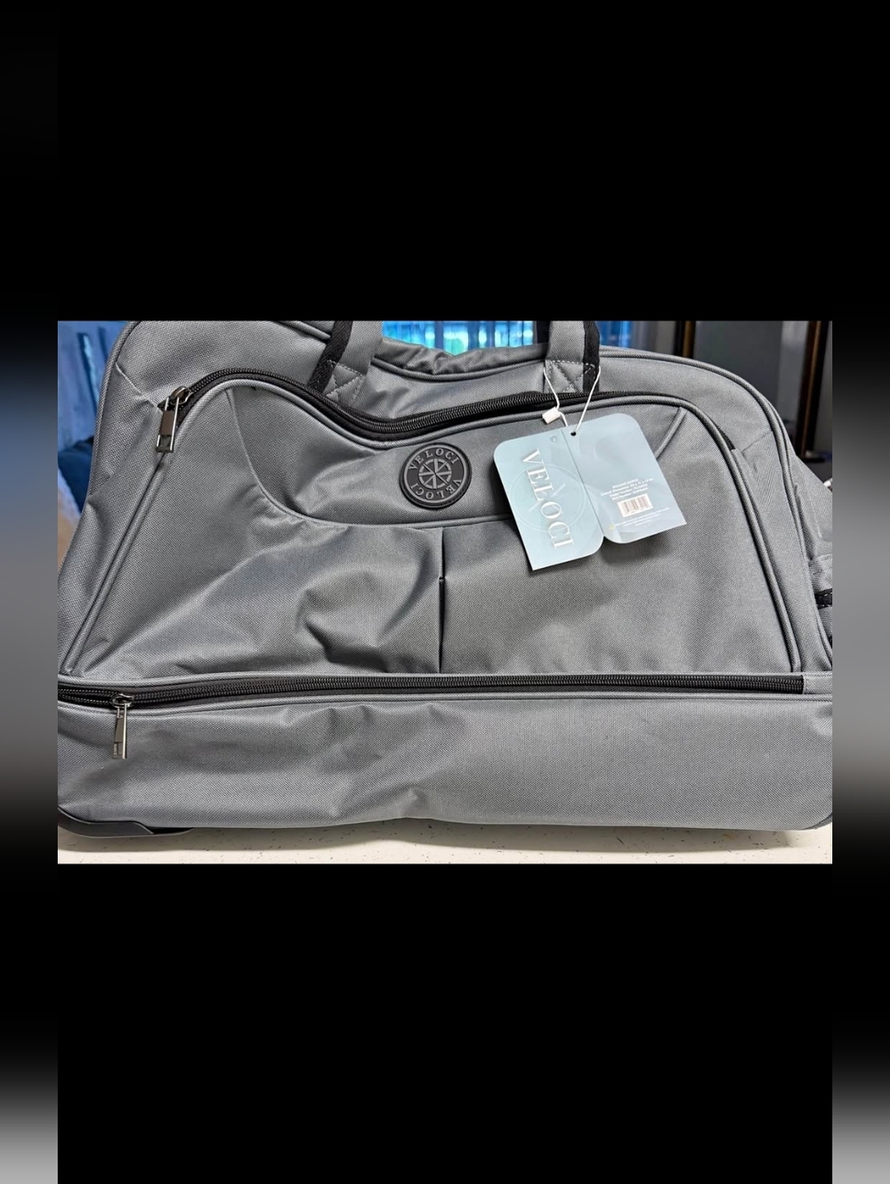 Brand new rolling Duffle Bag by veloci.(i Have The Set On My Page ) 20x11x13